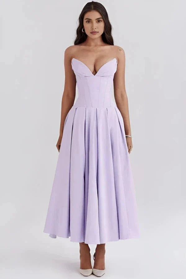 Vestido Laarni con corpiño esculpido y ballenas y falda voluminosa