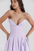 Vestido Laarni con corpiño esculpido y ballenas y falda voluminosa