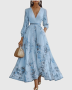 Rowella | Elegante abito lungo plissettato con scollo a V e cintura a nastro in vita