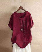 Kelly | Solid-color short-sleeved blouse with a round neckline 9