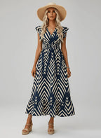 Women's long dress with V-neck and geometric print, elasticized waist
